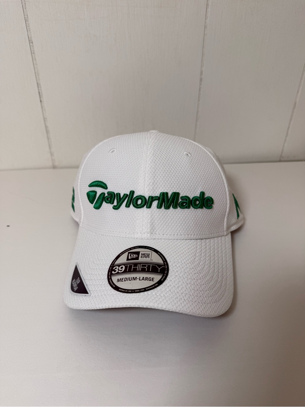 TaylorMade White Cap with Green Embroidered Logo